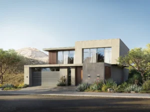 Modern two-story house with large windows, stone facade, and desert landscaping.