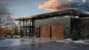 Modern house with large glass windows, two garage doors, and scenic mountains in the background.