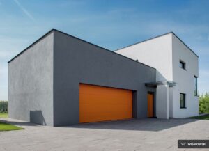 A high-quality image of a sleek and modern garage door with a vibrant color finish, designed to enhance the curb appeal of any home. The door features a smooth surface with a silk-line texture, offering a sophisticated and contemporary look.